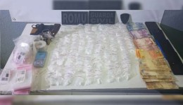 Casal é preso com droga, arma e BMW após perseguição, no Paraná