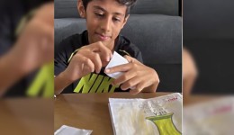 Sem álbum oficial, menino cria versão artesanal da Copa e encanta milhares nas redes sociais