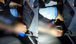 Motorista embriagado confunde câmbio com copo de bebida durante abordagem