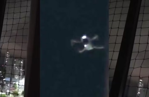 Moradores seguem drone que sobrevoava apartamentos, descobrem piloto escondido em caixa d'água e ele acaba preso