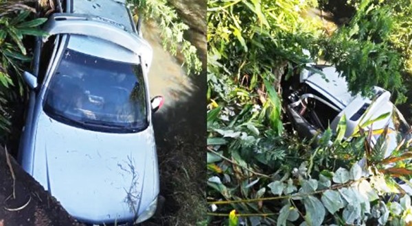 Homem é socorrido após cair com carro em riacho no interior